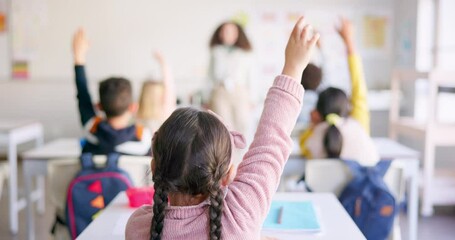 Learning, question and hands raised with girl in classroom for education, discussion and knowledge. Help, studying and teacher with children and woman at school for why, scholarship and answer - Powered by Adobe