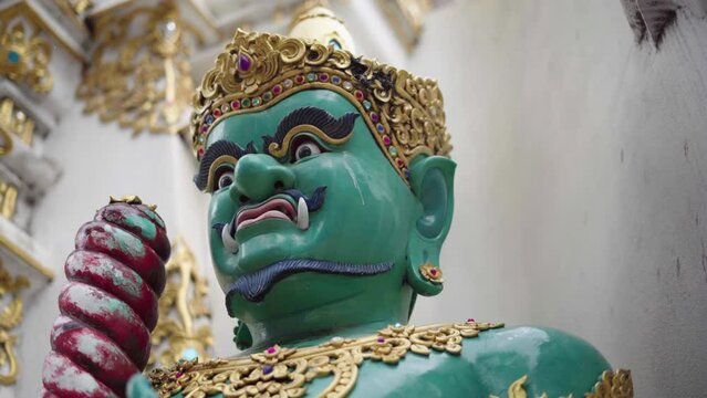 statue of a warrior at the gate of Wat Chedi Luang Worawihan temple, chiang mai, thailand