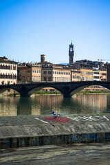 Santa Trinita Bridge Over Arno River in Florence, Italy - Iconic Cityscape with Arnolfo Tower - obrazy, fototapety, plakaty