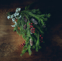 Christmas decoration made with natural fir twigs and cones. Top view - 641865306