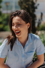 Brunette business woman smiling. Front view photo