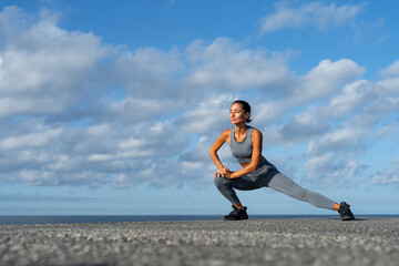 Obraz na płótnie Canvas athletic brunette girl doing fitness doing exercises leading a healthy lifestyle