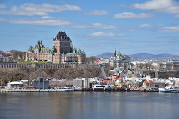 Old Quebec cityscape seen from Levis. Ferry on St-Lawrence river. Frontenac castle.
