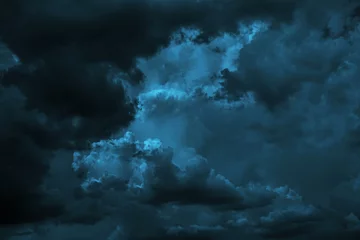 Tuinposter Black dark greenish blue dramatic night sky. Gloomy ominous storm rain clouds background. Cloudy thunderstorm hurricane wind lightning. Epic fantasy mystic. Or creepy spooky nightmare horror concept. © Наталья Босяк