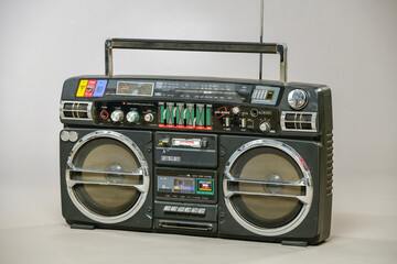 retro radio tape recorder on gray background isolated. disco music background.