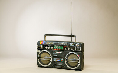 retro radio tape recorder on gray background isolated. disco music background.