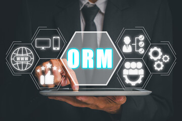 ORM, Online Reputation Management Optimization Business concept, Businessman using tablet with...