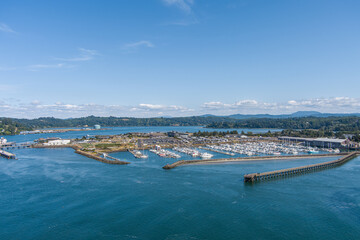 Aerial view of a Marina Harbor in the Yaquina River at Florence Oregon on a bright sunny day during late summer.