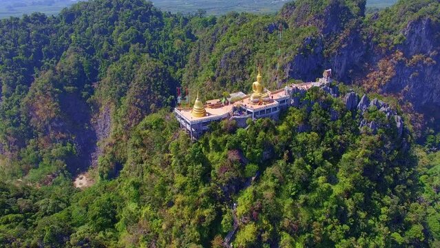 .Aerial view Tiger Cave Temple is a Buddhist temple in Krabi, Thailand. .It is known for the tiger paw prints in the cave, .tall Buddha statues and the strenuous flight of stairs to reach the summit..