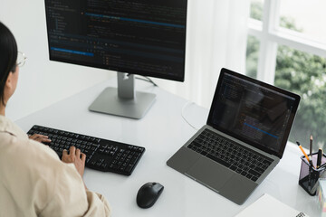 Developer programmer programming code to developing website and application in software office