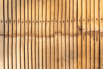 Old Bamboo slats lined up as a fence