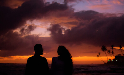 silhouette of a couple on a beach