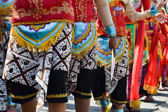 kid wearing traditional indonesia cloth, kebaya or batik indonesia, celebration of indonesia independence day 17 agust.