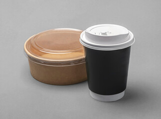 Disposable paper container with plastic lid. Takeaway food meal. Recyclable material. Eco friendly packaging. Rice bowl and coffee cup.
