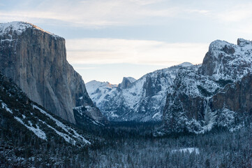 Panoramic view of a snow-covered Yosemite Valley, at Dawn.
