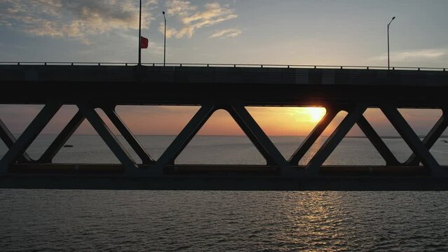 Drone view of sunset at Padma bridge which is the largest bridge of Bangladesh