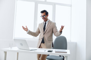 Man technology person business manager businessman office happy internet portrait suit winner...