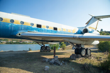 View of old abandoned plane in outdoors.