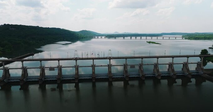 Panoramic View Of Big Dam Bridge Gates Over Arkansas River In Cook's Landing Park, North Little Rock, Arkansas USA. Aerial Shot