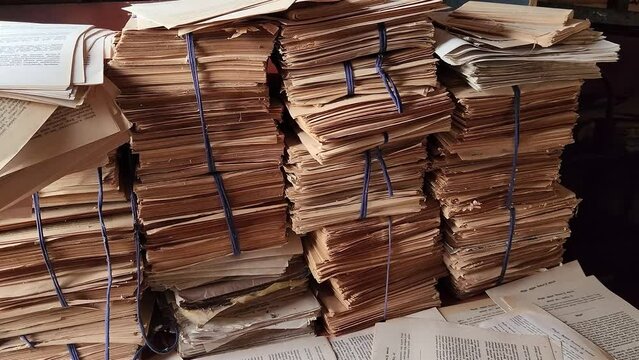 Old Parchment Papers Stacked in an office building