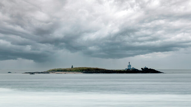 The lighthouse of Teignouse. Coastal landscape overlooking the lighthouse of Teignouse, in Quiberon, seen from the tip of Conguel.
