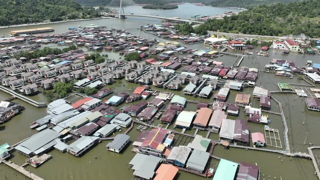 Drone Brunei's Famed water village Kampong Ayer in Bandar Seri Begawan, Villages are fully self sufficient with their own water, shops.