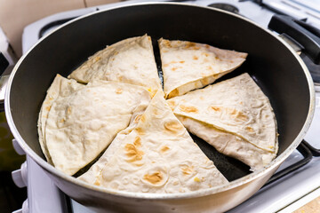 fried tortilla on a white plate. snack.food concept.