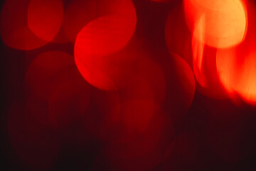 Red bokeh lights with copy space on dark background