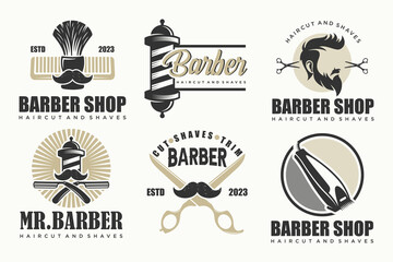 Set of vintage barber shop logo, labels, badges and design element.