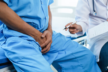 Urinary tract cancer specialists examine patients for prostate cancer. abnormal cells form and grow...