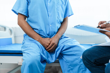 Urinary tract cancer specialists examine patients for prostate cancer. abnormal cells form and grow...