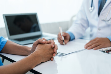 Doctor examines the health of male patient who has heart disease. physician who's an expert in the care of your heart and blood vessels,  sign of abnormal heart rhythm or coronary artery disease.