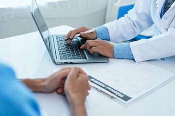 Doctor examines the health of male patient who has heart disease. physician who's an expert in the care of your heart and blood vessels,  sign of abnormal heart rhythm or coronary artery disease.