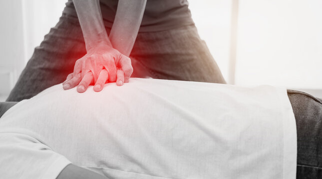 Heart attack, First aid Emergency CPR of Asian male people, CPR keeps blood circulating until the person's heart can be shocked back into a normal rhythm with an automated external defibrillator AED