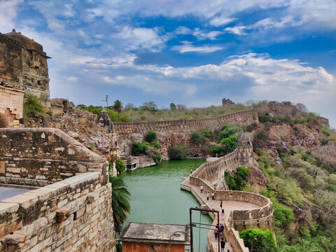 Picture of Gaumukh Kund at Chittorgarh Fort shot during daylight against white clouds and blue sky