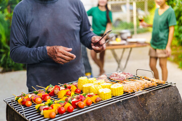 barbecue party with a happy family on weekends
