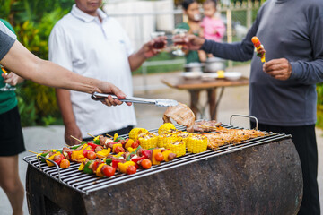 barbecue party with a happy family on weekends