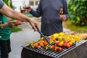 barbecue party with a happy family on weekends