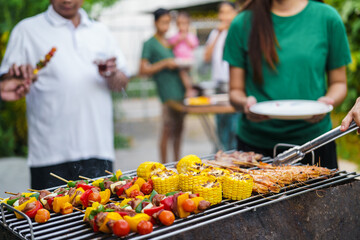 barbecue party with a happy family on weekends