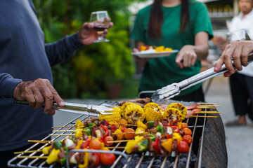 barbecue party with a happy family on weekends