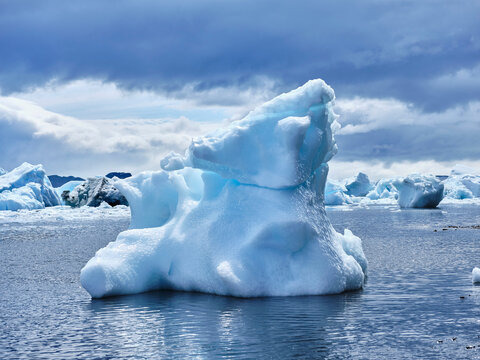 Blue iceberg formation above ocean surface, Antarctic Peninsula, Weddell Sea, Antarctica

