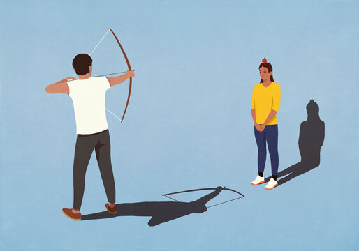 Man with bow and arrow aiming for apple on head of frightened wife
