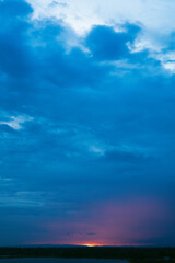 The sun was setting in the horizon, a red light shot out. before the sun is about to fall