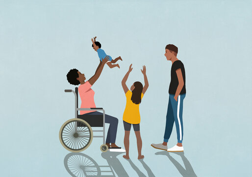 Family watching happy mother in wheelchair playing, lifting son overhead
