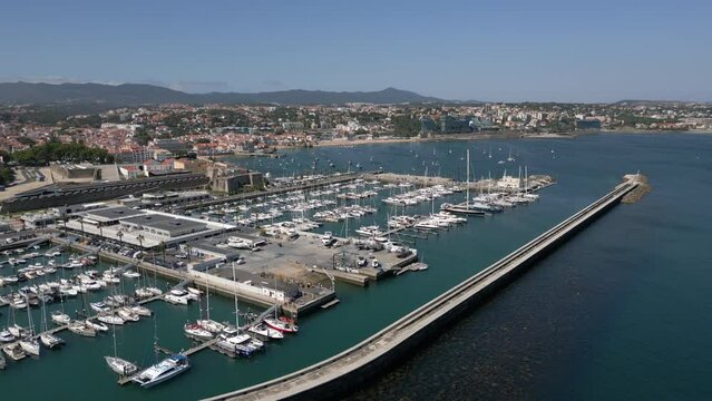 Aerial view of the Cascais Marina during summer in Cascais, Lisbon District, Portugal. The Cascais Marina is the largest marina on the Portuguese Riviera and the third largest in the country.