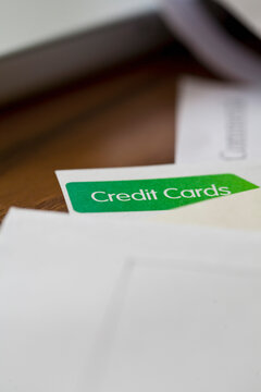 Extreme close up of letters and financial documents
