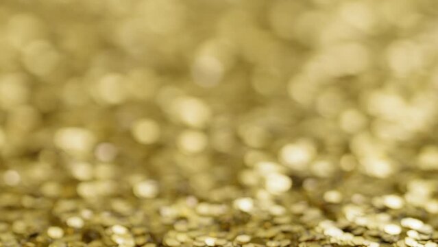 Gold glitter, abstract background establishing shot