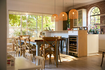 Interior Of Modern Home With Kitchen Area Counter With Dining Table 