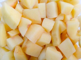 slices of potato. Textured of raw potatoes. vegetables. cooking preparation. healthy living.
