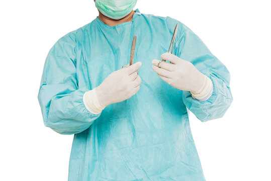 Surgery scalpel in hand of doctor.